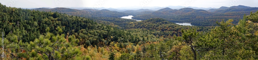 Panoramic view of mountains and a river in fall