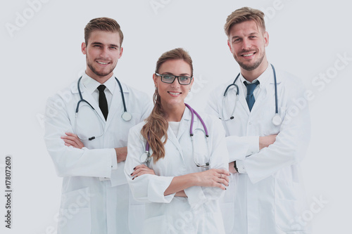 Portrait of group of smiling hospital colleagues standing togeth