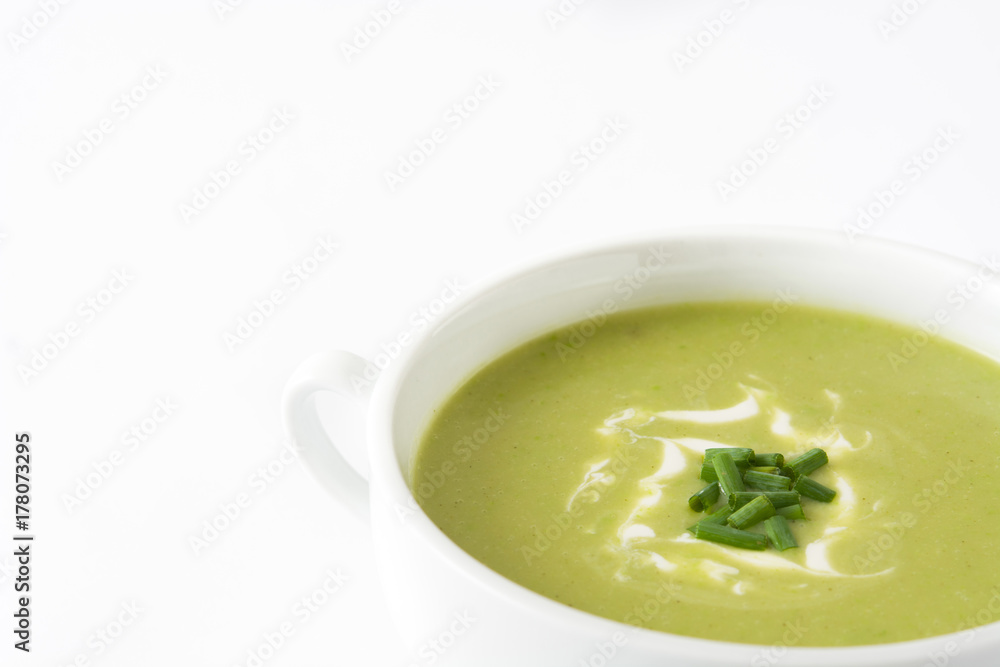 zucchini soup in bowl isolated on white background zucchini soup in bowl isolated on white background