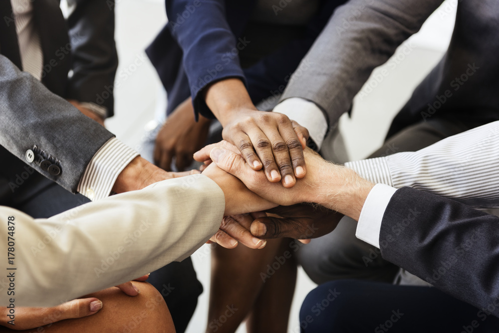 Business people joined hands together as teamwork Business people joined hands together as teamwork