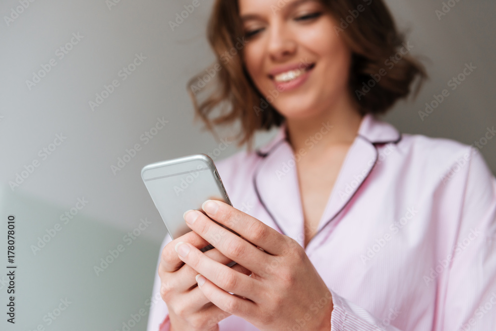Close up portrait of a smiling pretty girl in pajamas Close up portrait of a smiling pretty girl in pajamas