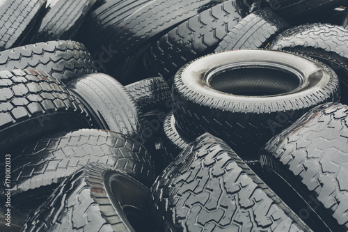Pile of discarded car tires photo