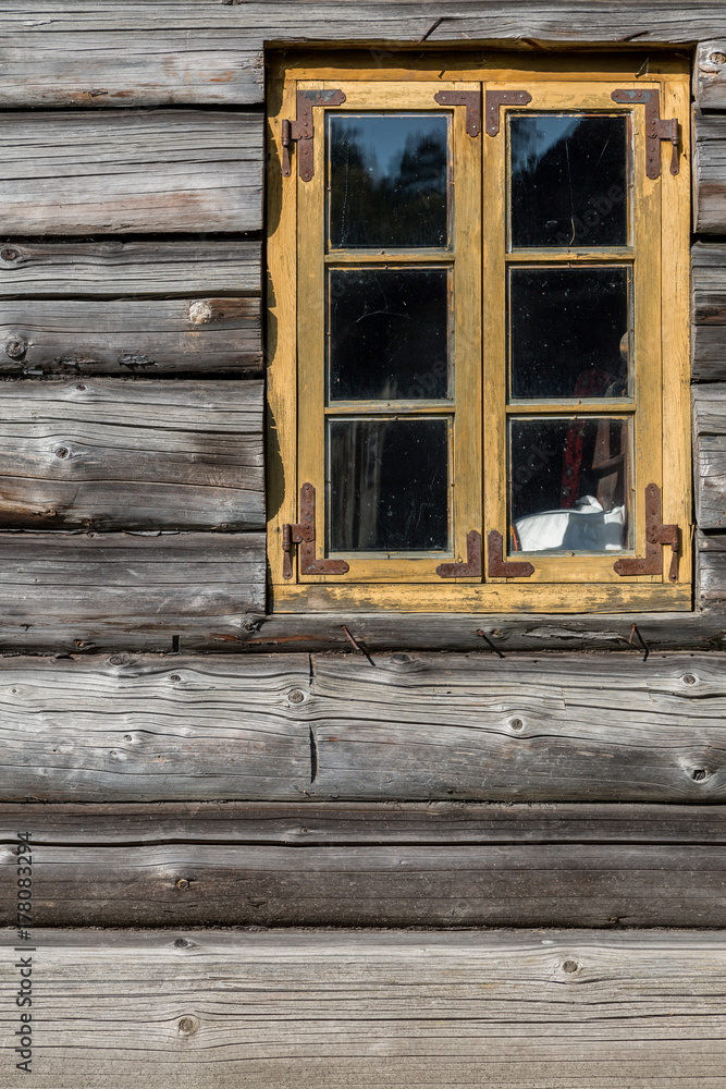 Old-fashioned window of wooden house Old-fashioned window of wooden house