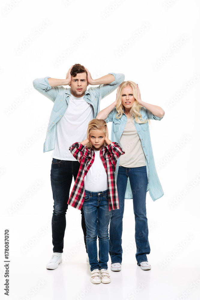Full length portrait of an irritated upset family Full length portrait of an irritated upset family