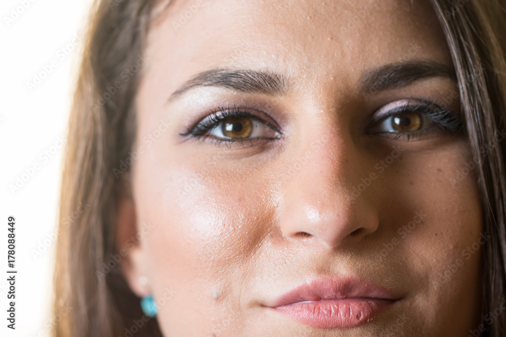 Fototapeta premium Closeup headshot of beautiful young teenage smiling girls face