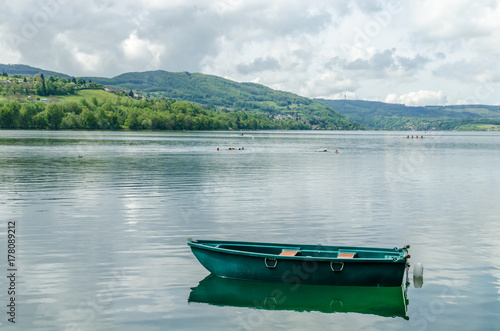 the green small boat