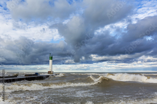Lighthouse and Pier in Stormy Weather - Lake Huron