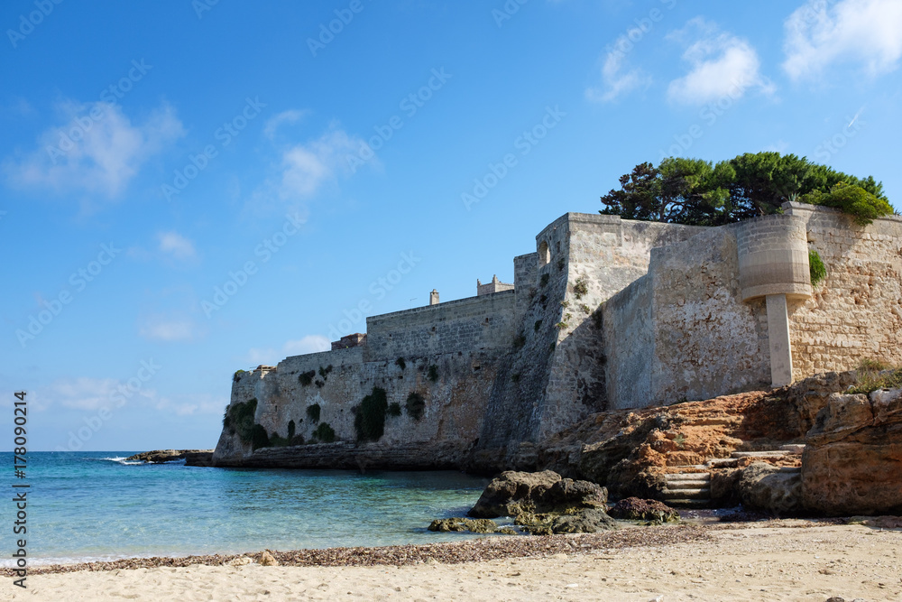 Old fortress along Apulian coastline. Monopoli, Italy.