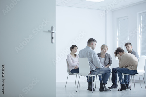 Woman crying in rehab center photo