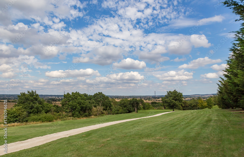Golf course green with a path leading you in. Golf course green with a path leading you in.