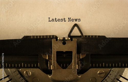 Text Latest News typed on retro typewriter