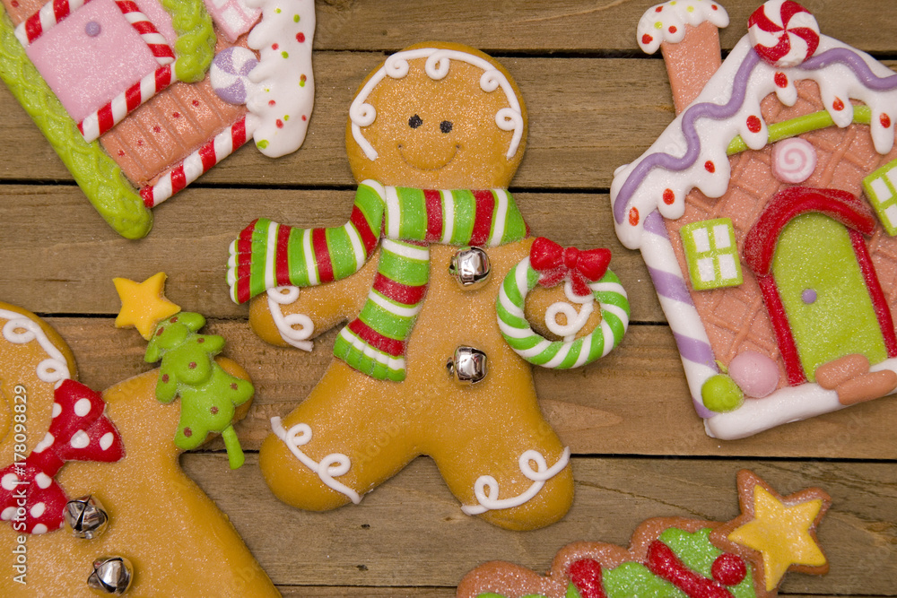 Christmas Gingerbread Cookies on a Wooden Table Christmas Gingerbread Cookies on a Wooden Table