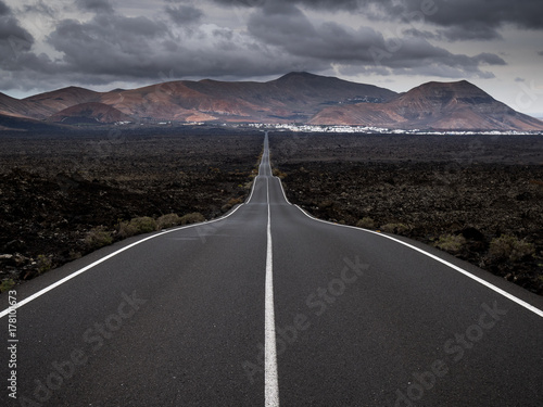 Never-Ending Road through Lava Fields on Lanzarote photo