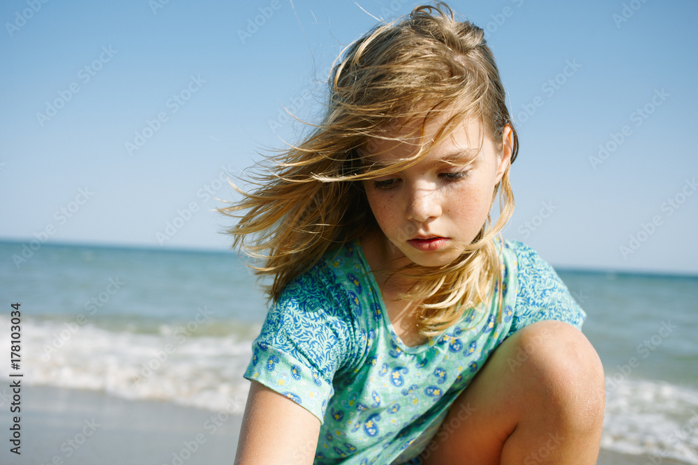 Close up of little girl playing at the beach Close up of little girl playing at the beach