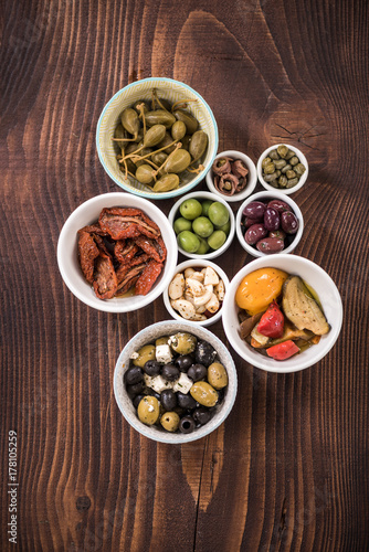 Selection of tapas in ceramic bowls