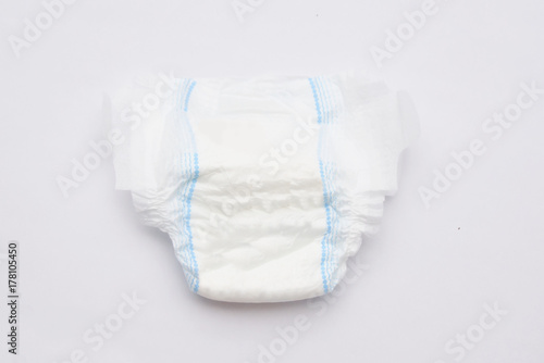 Tableau sur toile Disposable Baby Diapers Over White Background