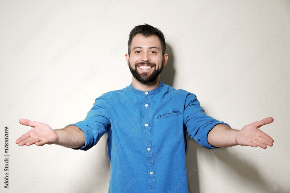 Handsome man on light background Handsome man on light background