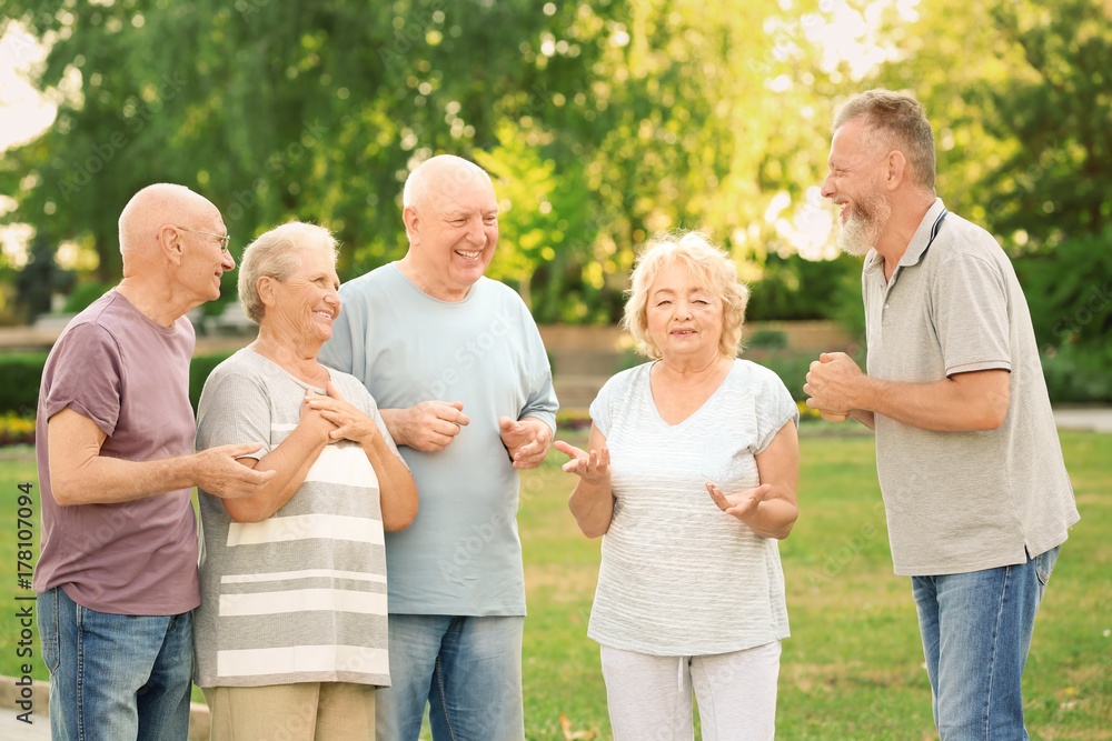 Group of elderly people resting in park Group of elderly people resting in park