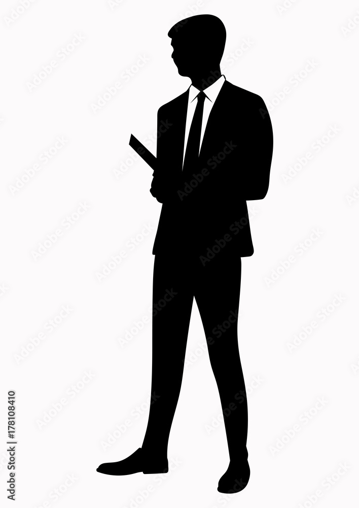 Silhouette of business man in tie and tablet in hands Silhouette of business man in tie and tablet in hands