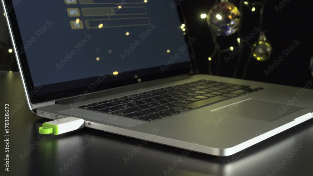 Downloading a files from notebook to USB flash disk in Christmas celebration time Downloading a files from notebook to USB flash disk in Christmas celebration time