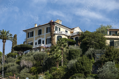 Portofino, Liguria Italia -  watching the coast from the sea. View of the bay of Portofino, Villa Altachiara, one of the most popular village on the Italian Riviera. © RiCi