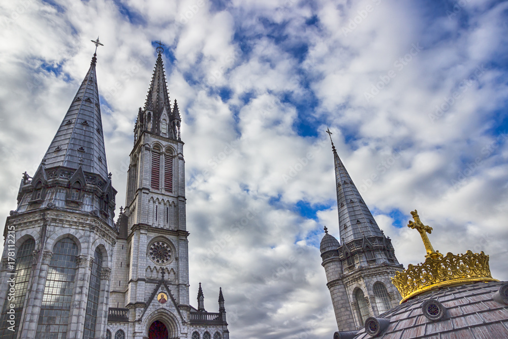 Sanctuary of Our Lady of Lourdes against the sky. France