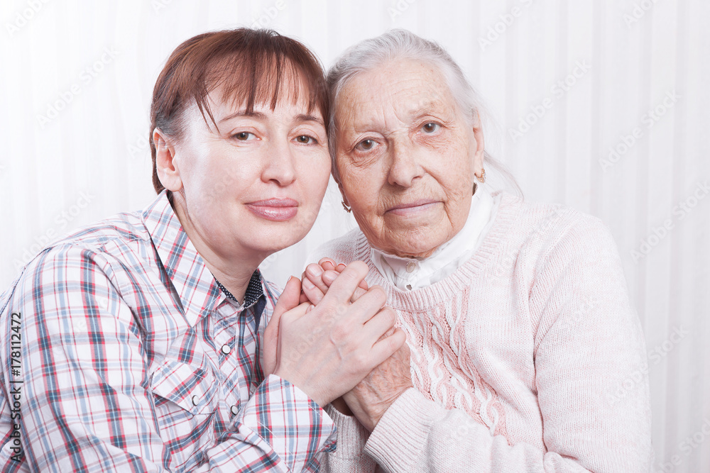 Seniors woman with her caregiver at home Seniors woman with her caregiver at home