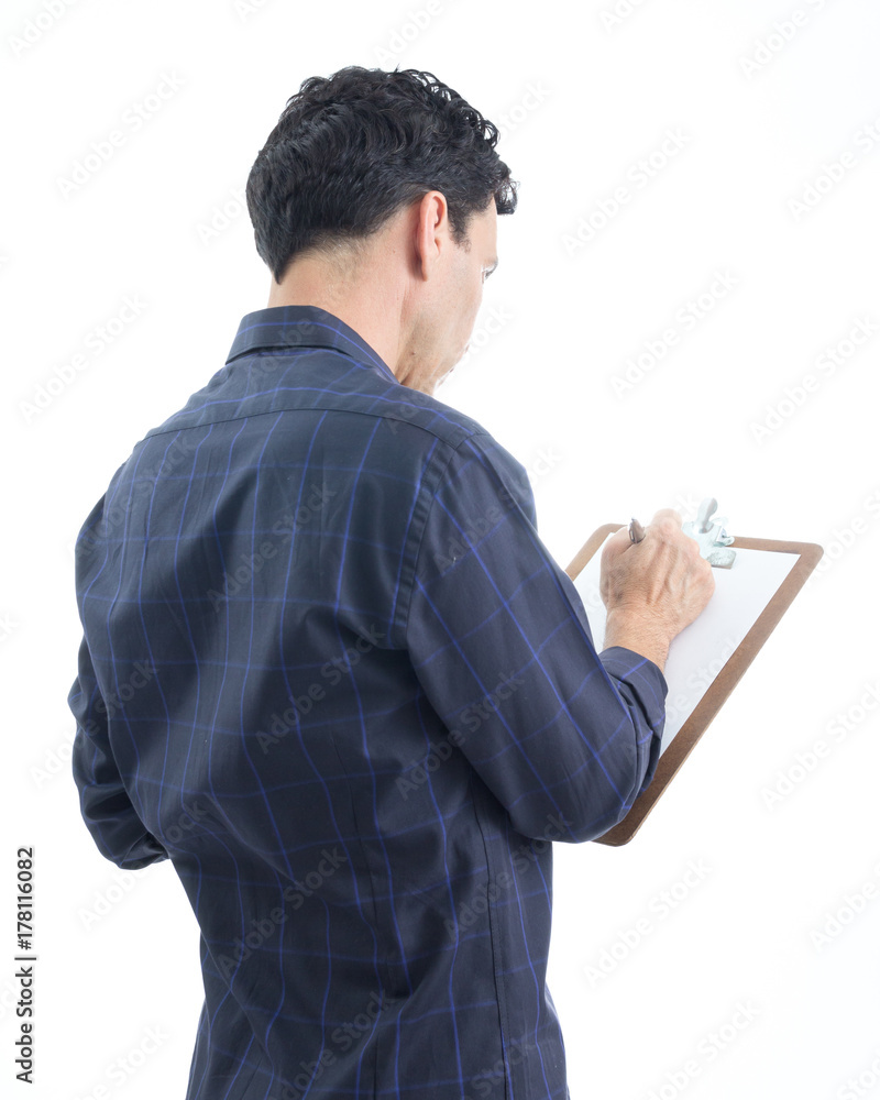 Man of quotas using a clipboard. The person is wearing dark blue social shirt. Isolated.. Man of quotas using a clipboard. The person is wearing dark blue social shirt. Isolated..