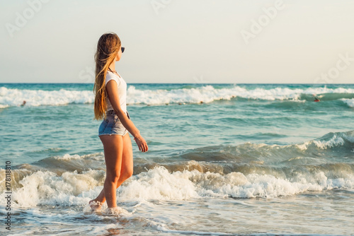 Wallpaper Mural Girl With Long Hair on the background of the sea sunset
 Torontodigital.ca