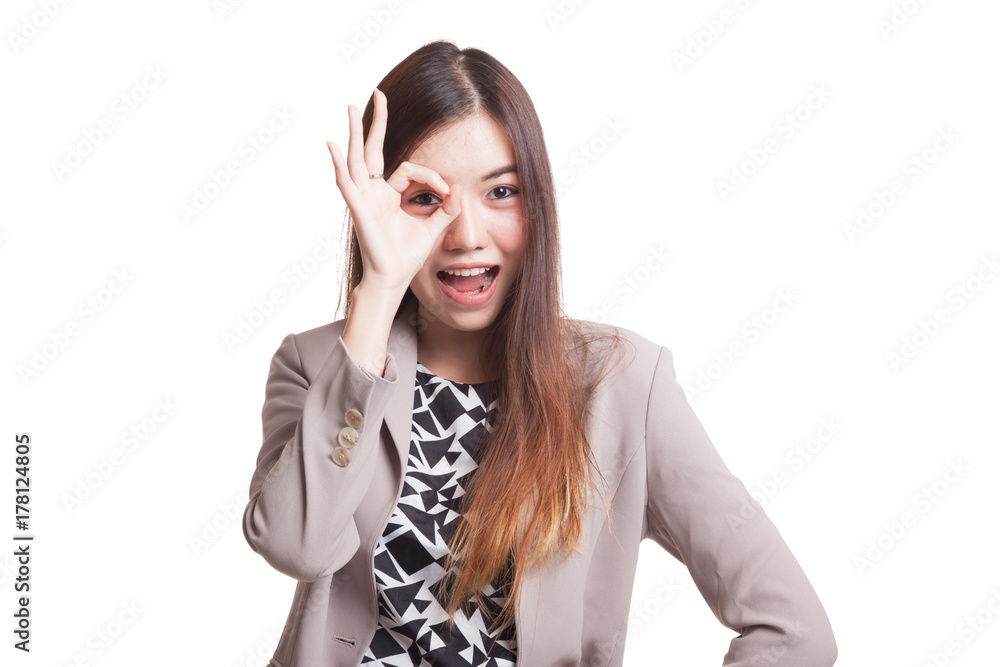 Beautiful young Asian woman show OK sign over her eye. Beautiful young Asian woman show OK sign over her eye.