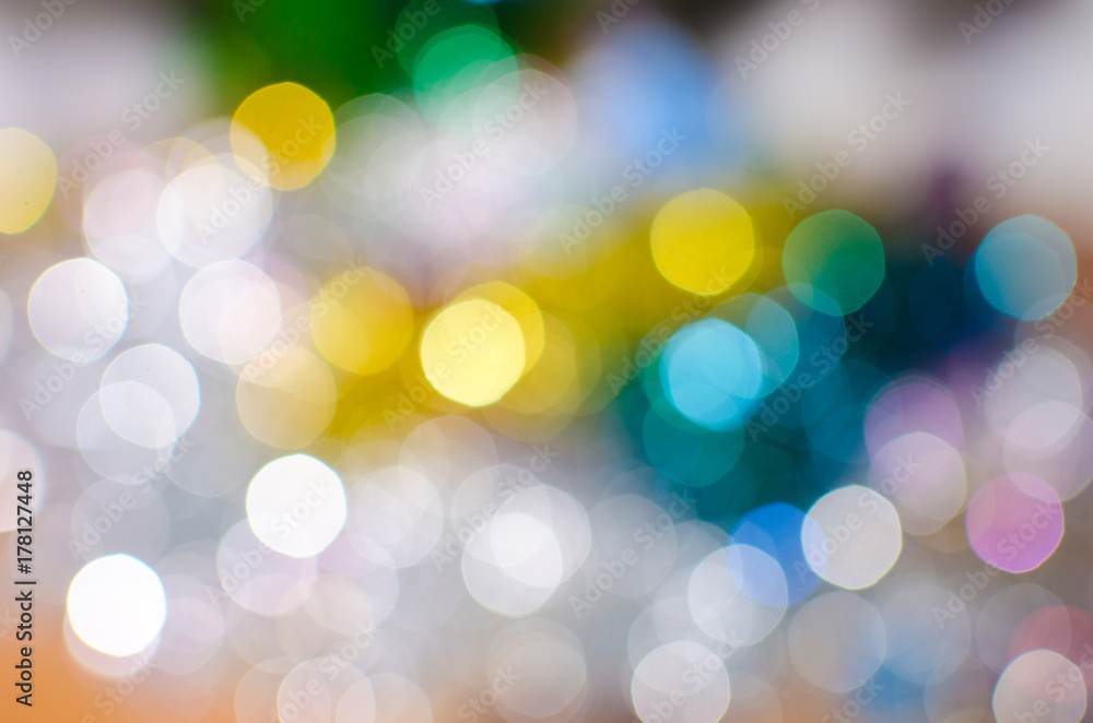 Fototapeta premium Bright colorful Christmas background, blurred bokeh holiday