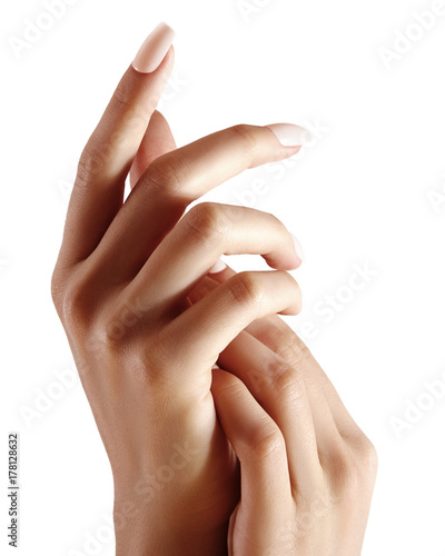 Beautiful woman's hands on light background. Care about hand. Tender palm. Natural manicure, clean skin. Light nails photo