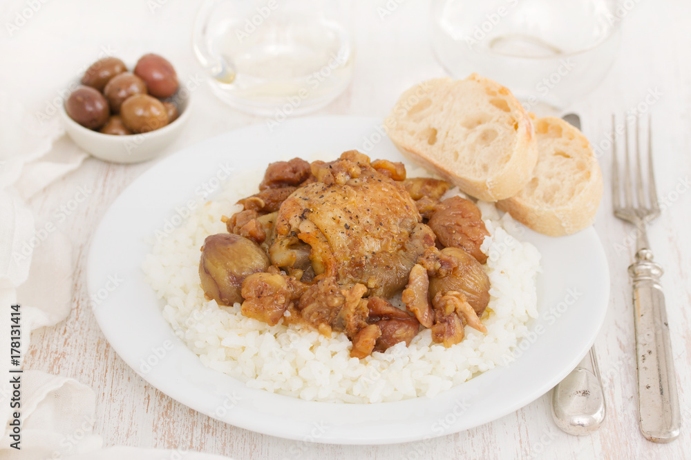 chicken with chestnuts and boiled rice on dish chicken with chestnuts and boiled rice on dish