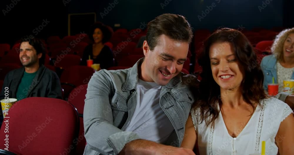 Romantic couple watching movie Romantic couple watching movie