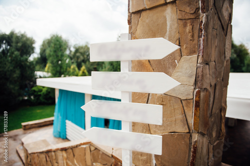 wedding ceremony in park. Focus on wooden pointer