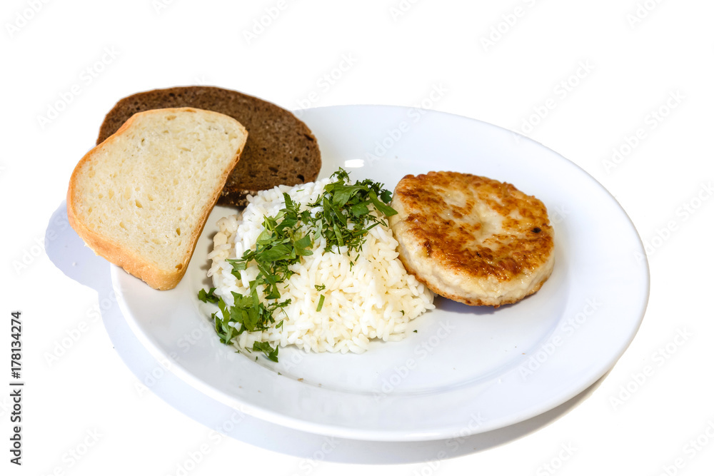 Cutlet with rice and bread isolated on white background