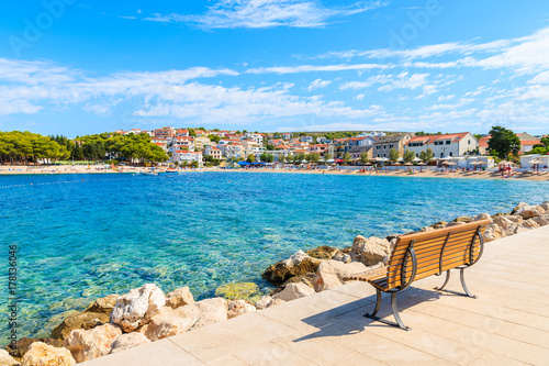 Bench on coastal promenade in Primosten town, Dalmatia, Croatia