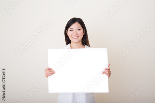 young asian woman with white board