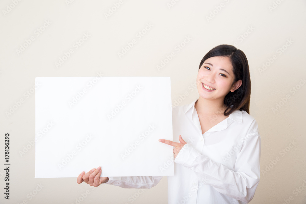 young asian woman with white board young asian woman with white board