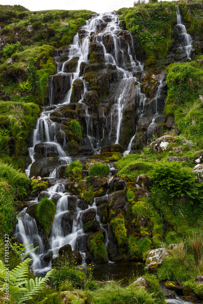 Small waterfall near Old Man of Storr on the Isle of Skye Small waterfall near Old Man of Storr on the Isle of Skye