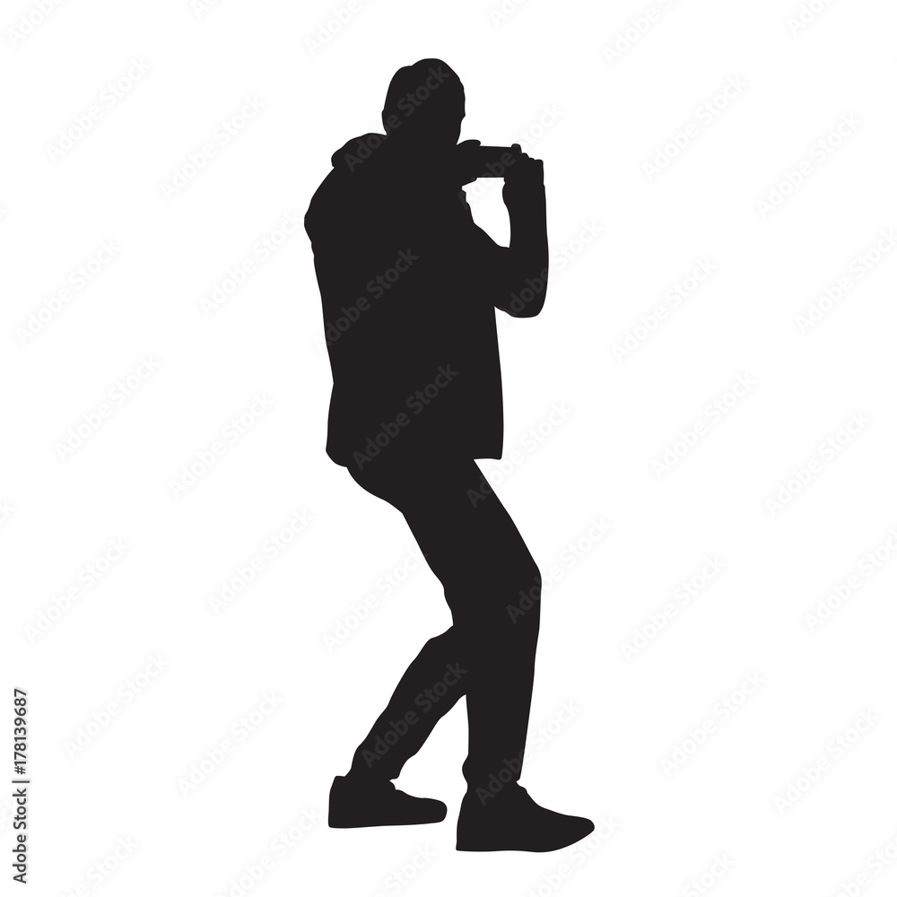 Man taking picture using mobile phone, vector silhouette Man taking picture using mobile phone, vector silhouette