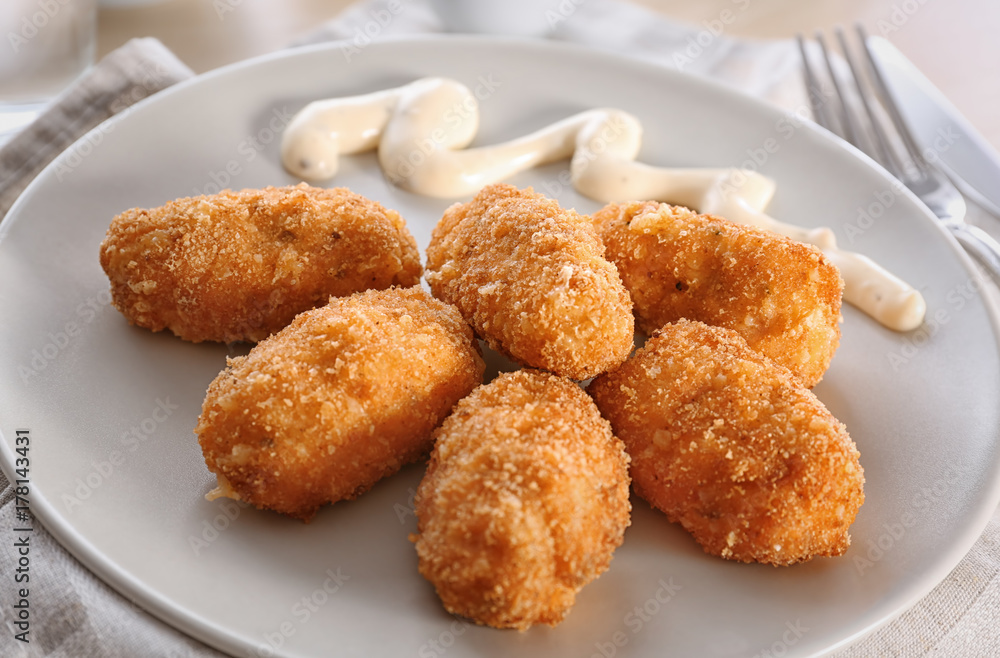 Delicious salmon croquettes on plate, closeup Delicious salmon croquettes on plate, closeup