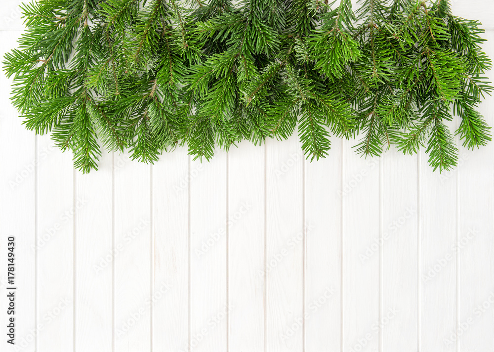 Christmas tree branches bright wooden background Christmas tree branches bright wooden background