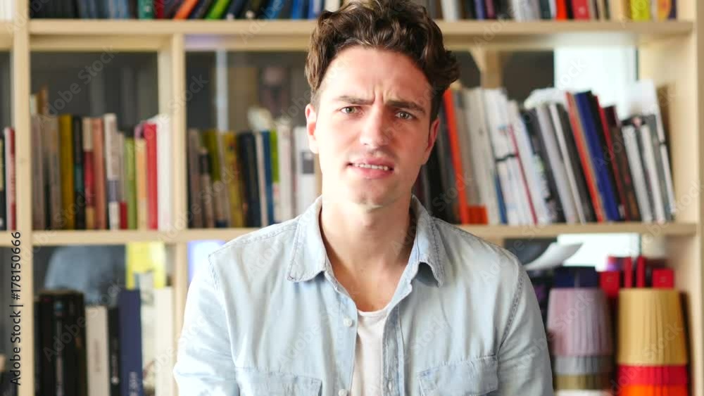 Frustrated Angry Man Yelling, Sitting in Office Frustrated Angry Man Yelling, Sitting in Office
