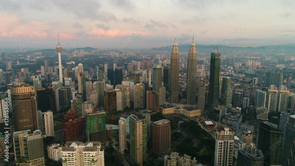 KUALA LUMPUR - CIRCA SEPTEMBER 2017: Aerial view. An iconic view of Petronas Twin Towers. KUALA LUMPUR - CIRCA SEPTEMBER 2017: Aerial view. An iconic view of Petronas Twin Towers.