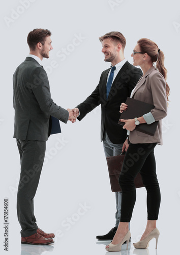 Handshake between business people isolated on white