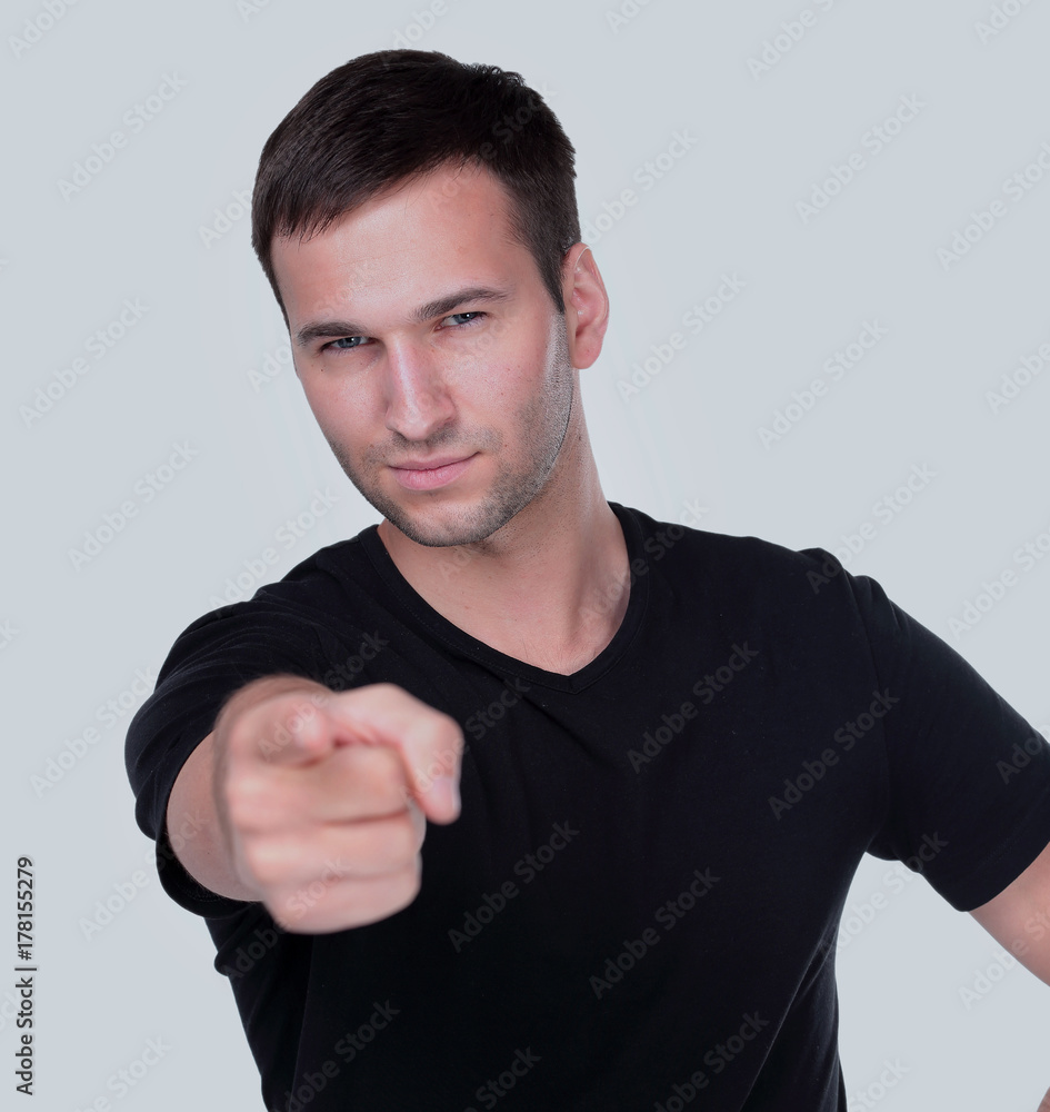 Handsome man points his finger at you Handsome man points his finger at you