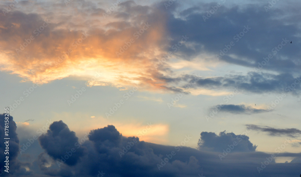 Beautiful dark bright sky with clouds at sunset. Nature.Natural background Beautiful dark bright sky with clouds at sunset. Nature.Natural background
