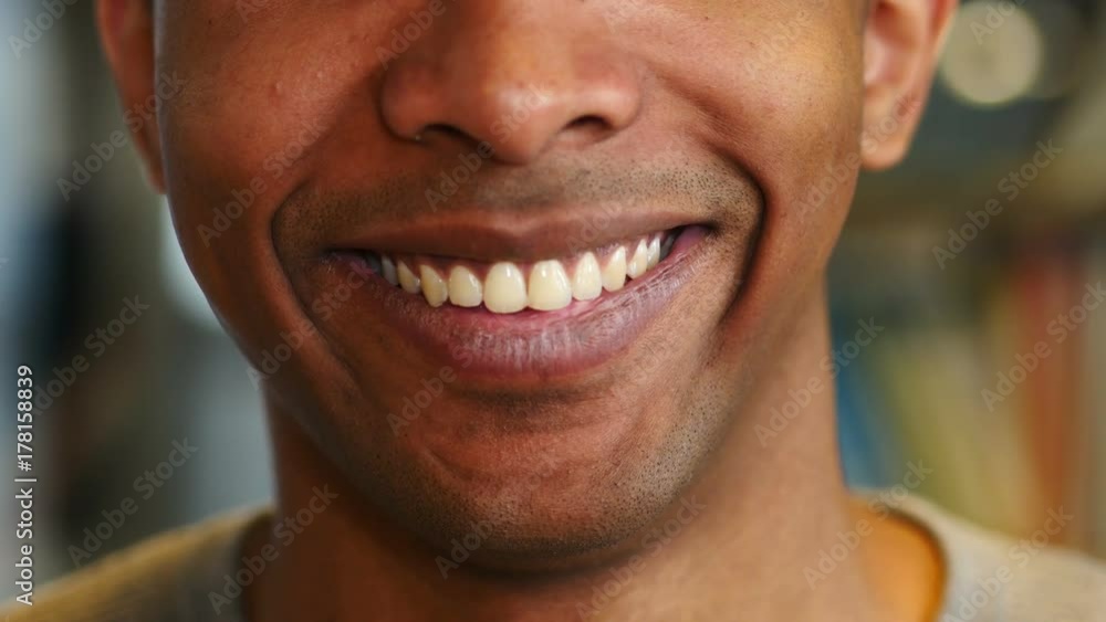 Close Up of Smiling Young Afro-American Man Lips nad Teeth Close Up of Smiling Young Afro-American Man Lips nad Teeth