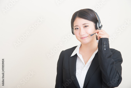 young asian woman with headset